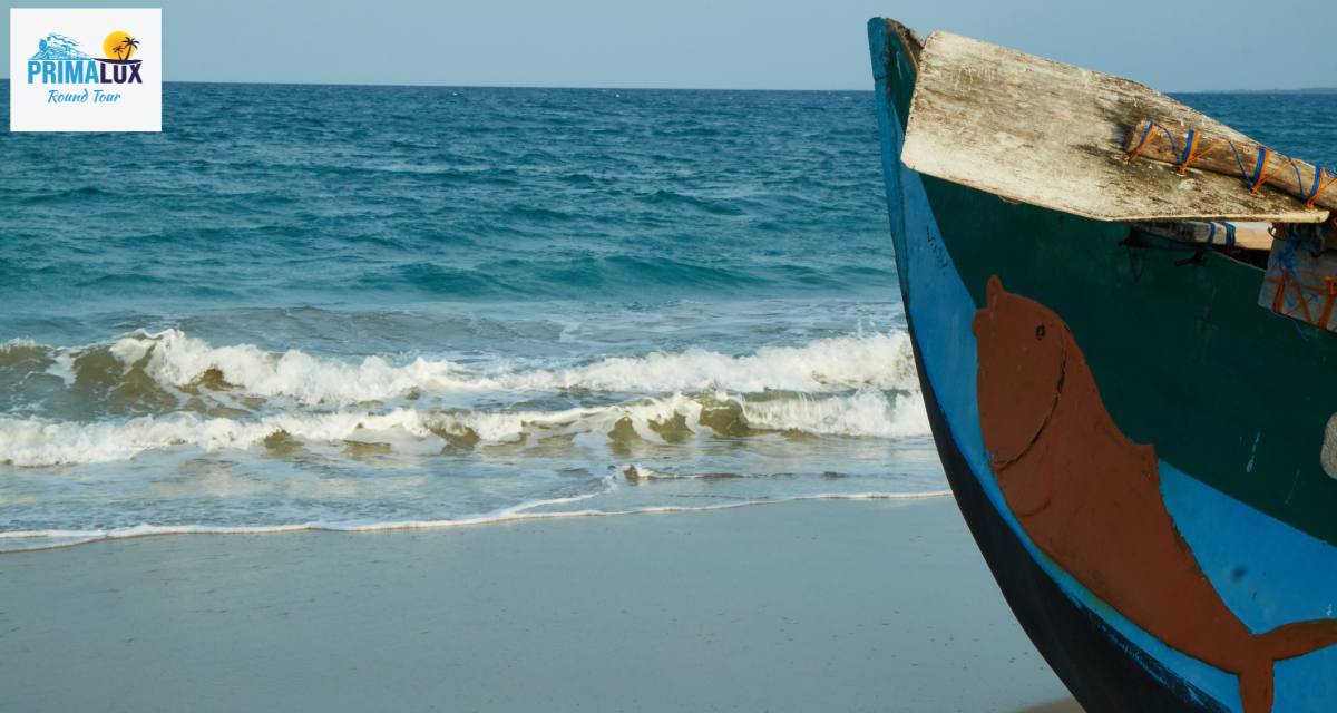 A colorful fishing boat on the shore of Nilaveli Beach